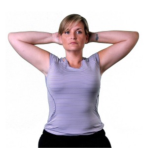 A woman in a striped tank top stretching her arm above her head.